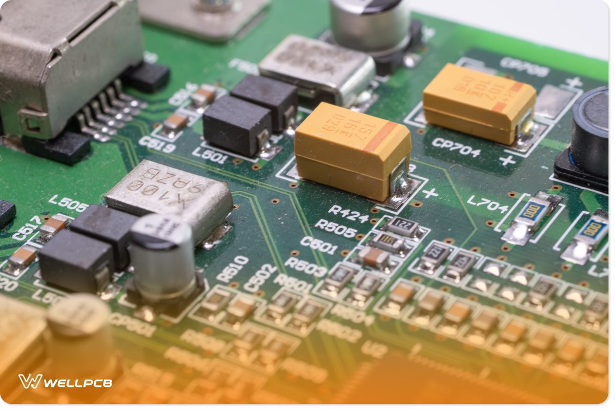 A PCB with various components, including capacitors