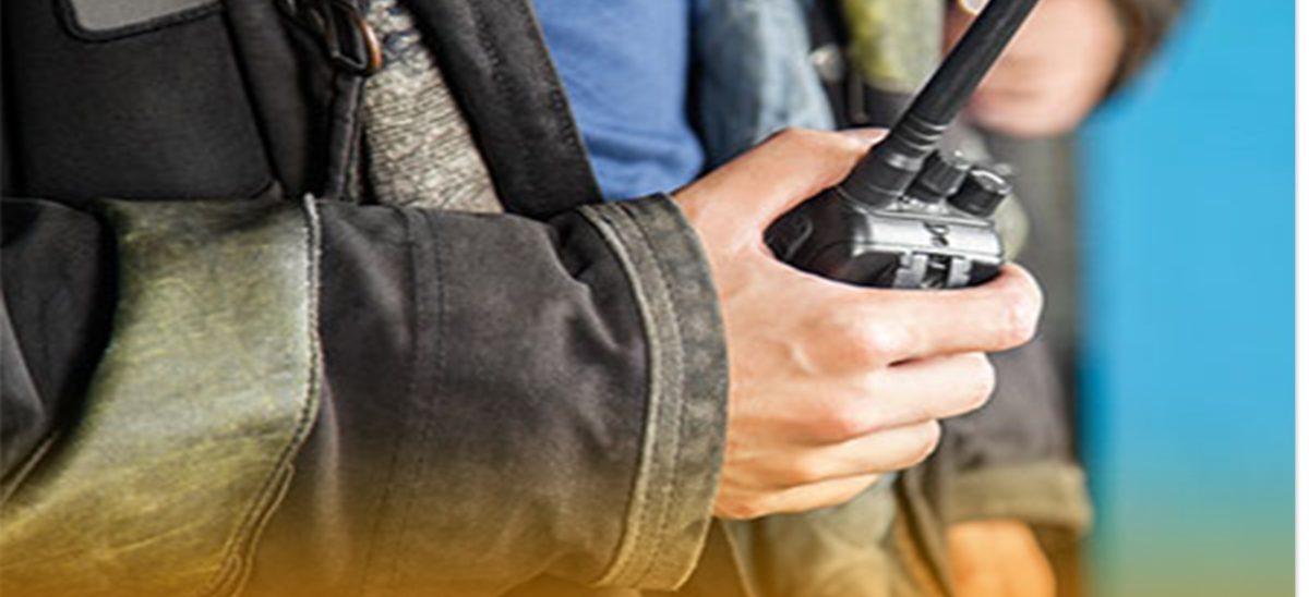 A man holding Walkie Talkie