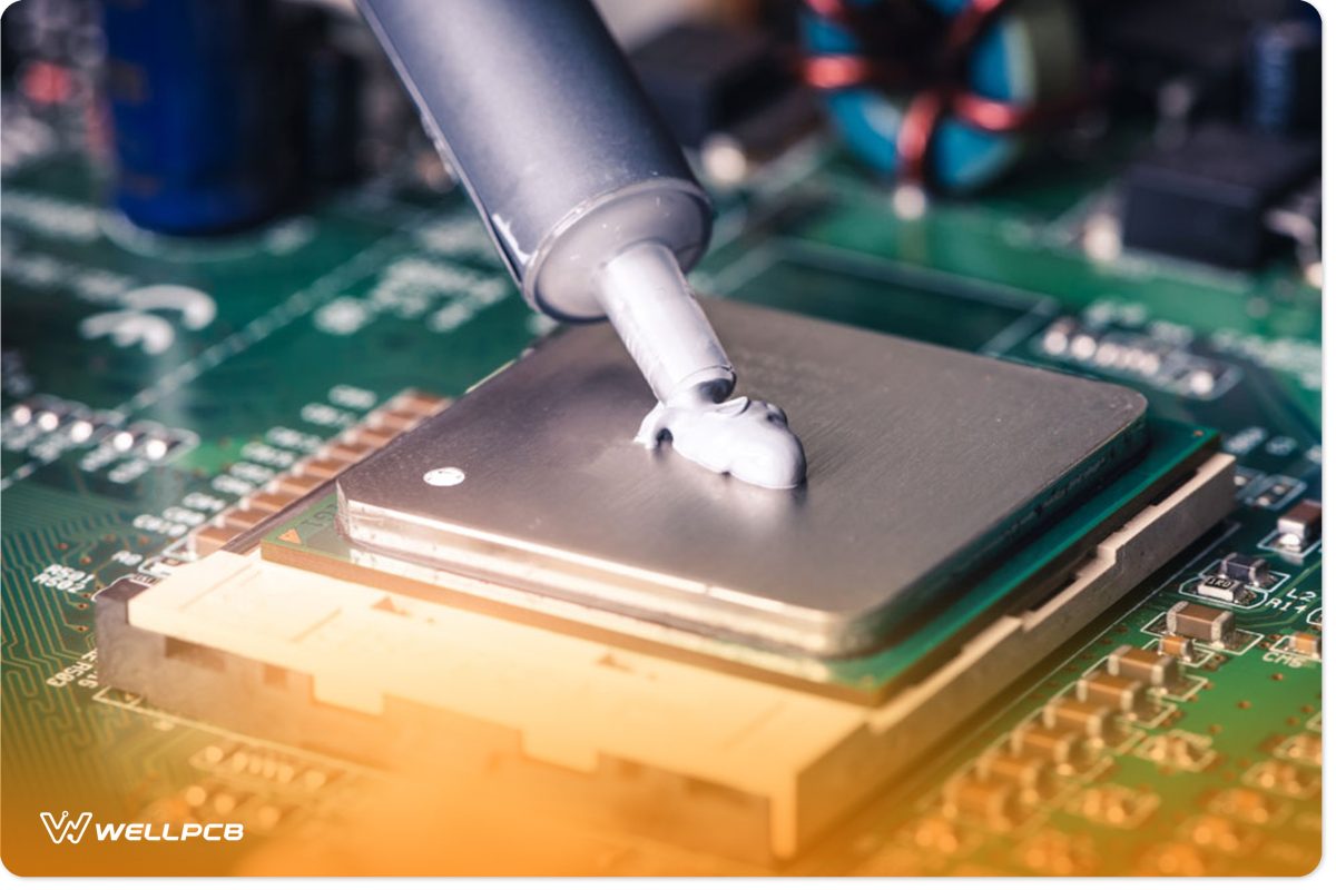 A technician squeezing fresh thermal paste