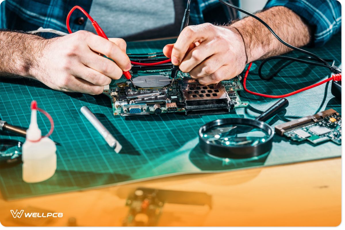 An Electronics Engineer Working on a Circuit Board