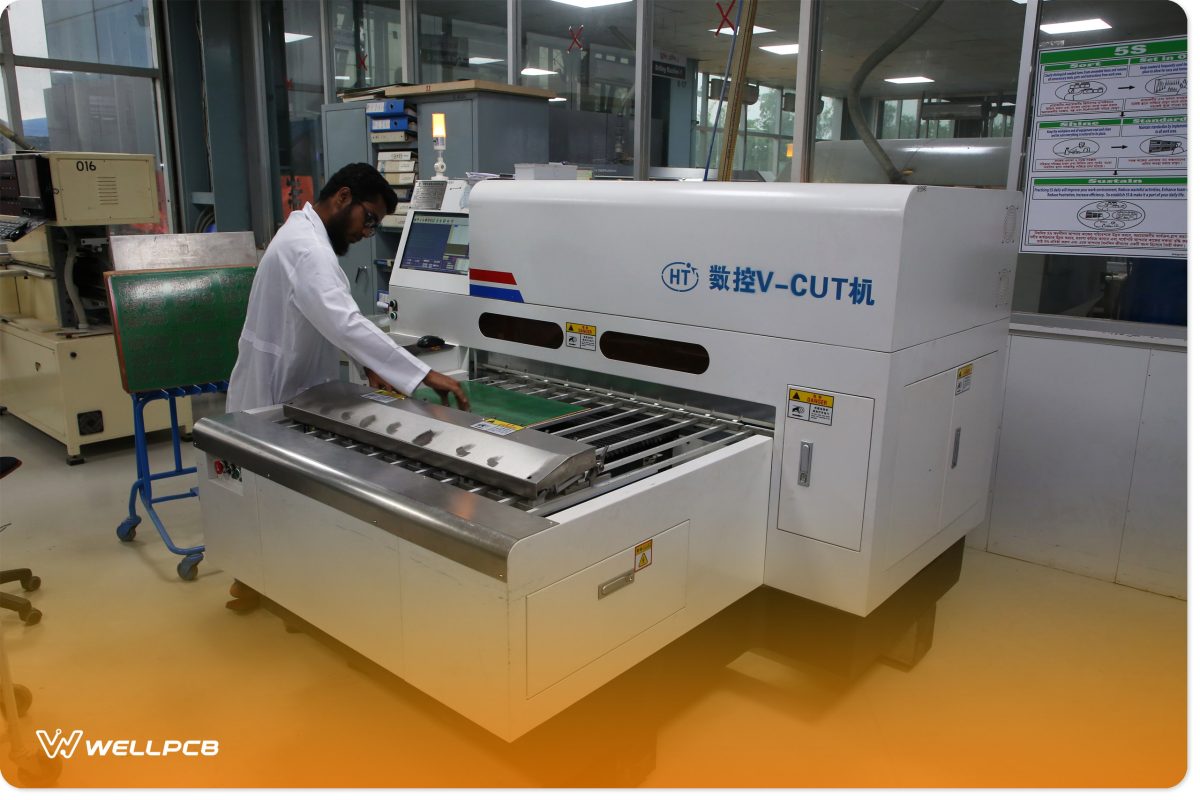 An engineer working on large-scale rigid-flex PCB production