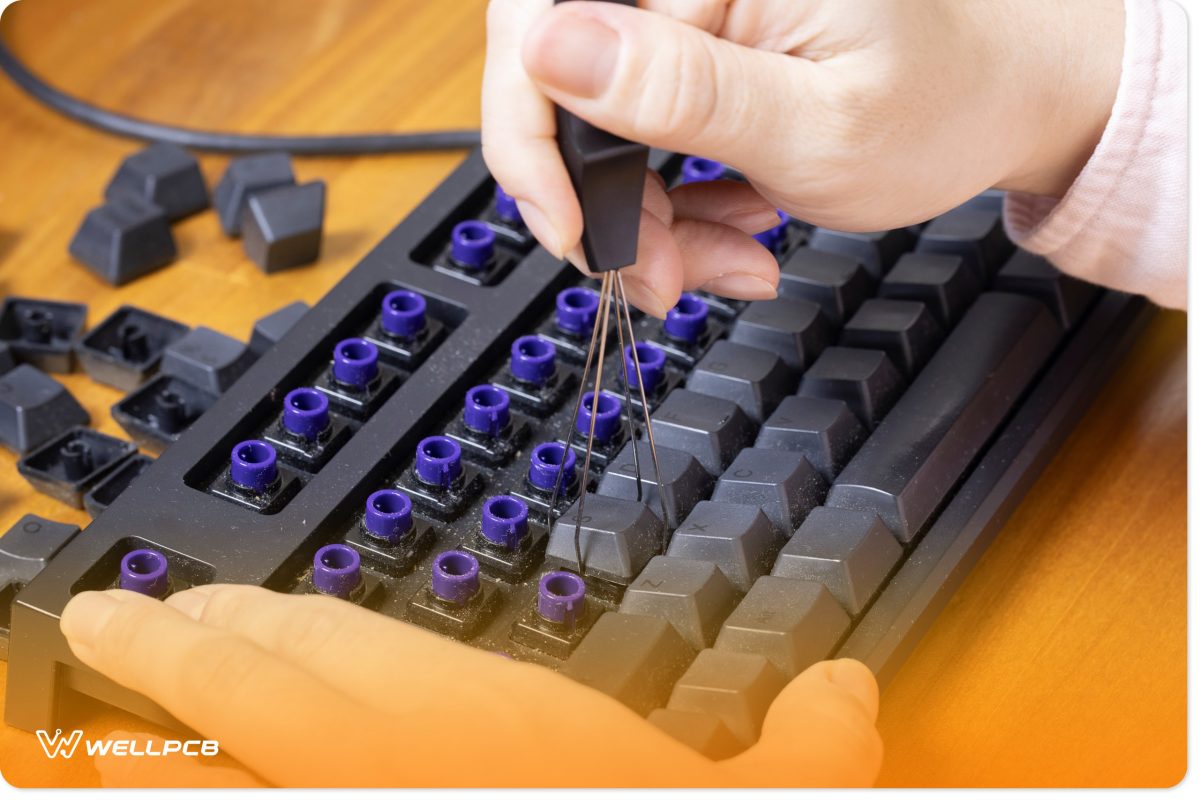 Man working on Mechanix keyboard 