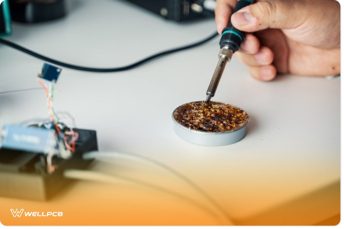 Skilled Man Hand Soldering Electronics