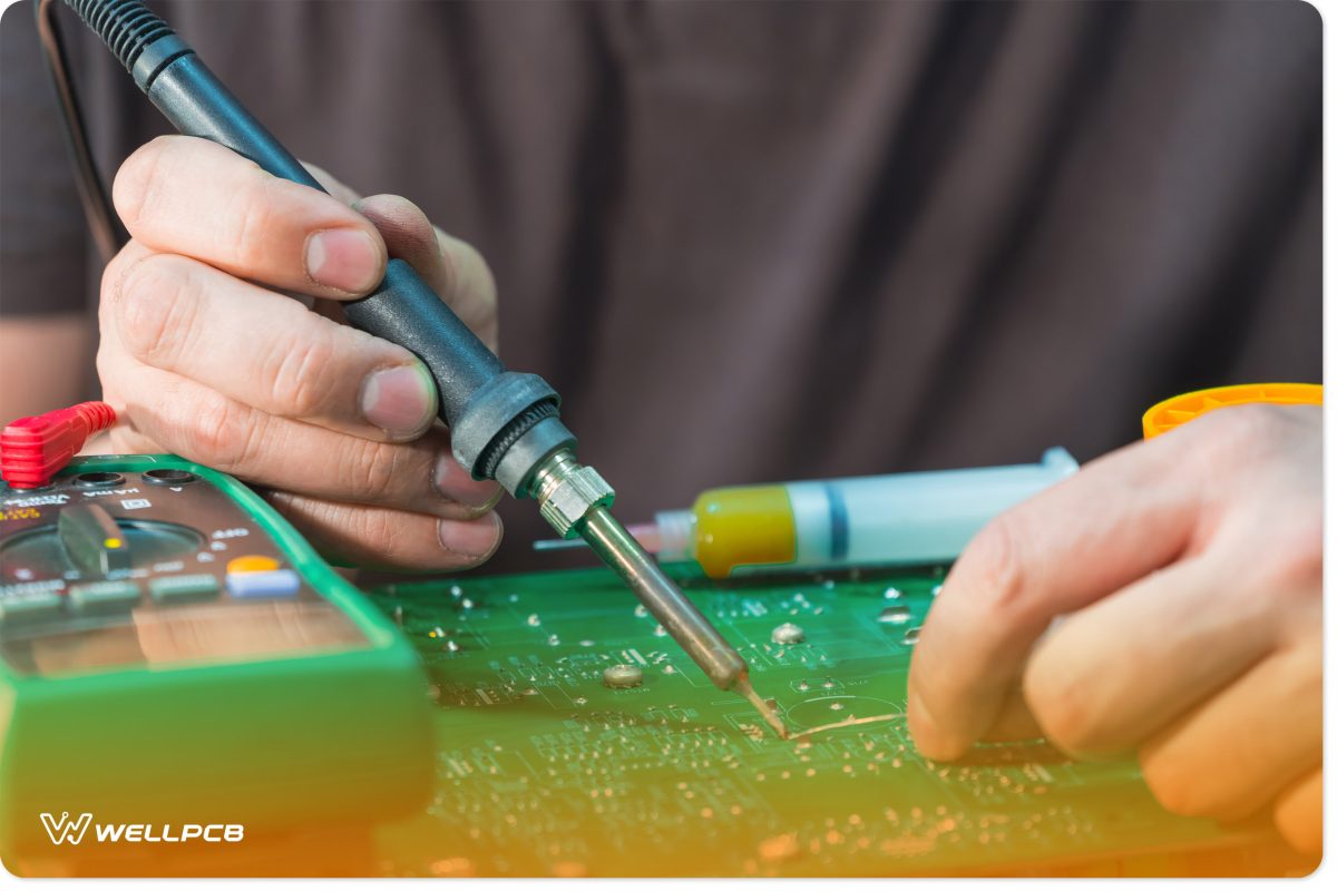 Skilled Man Hands Soldering Electronics